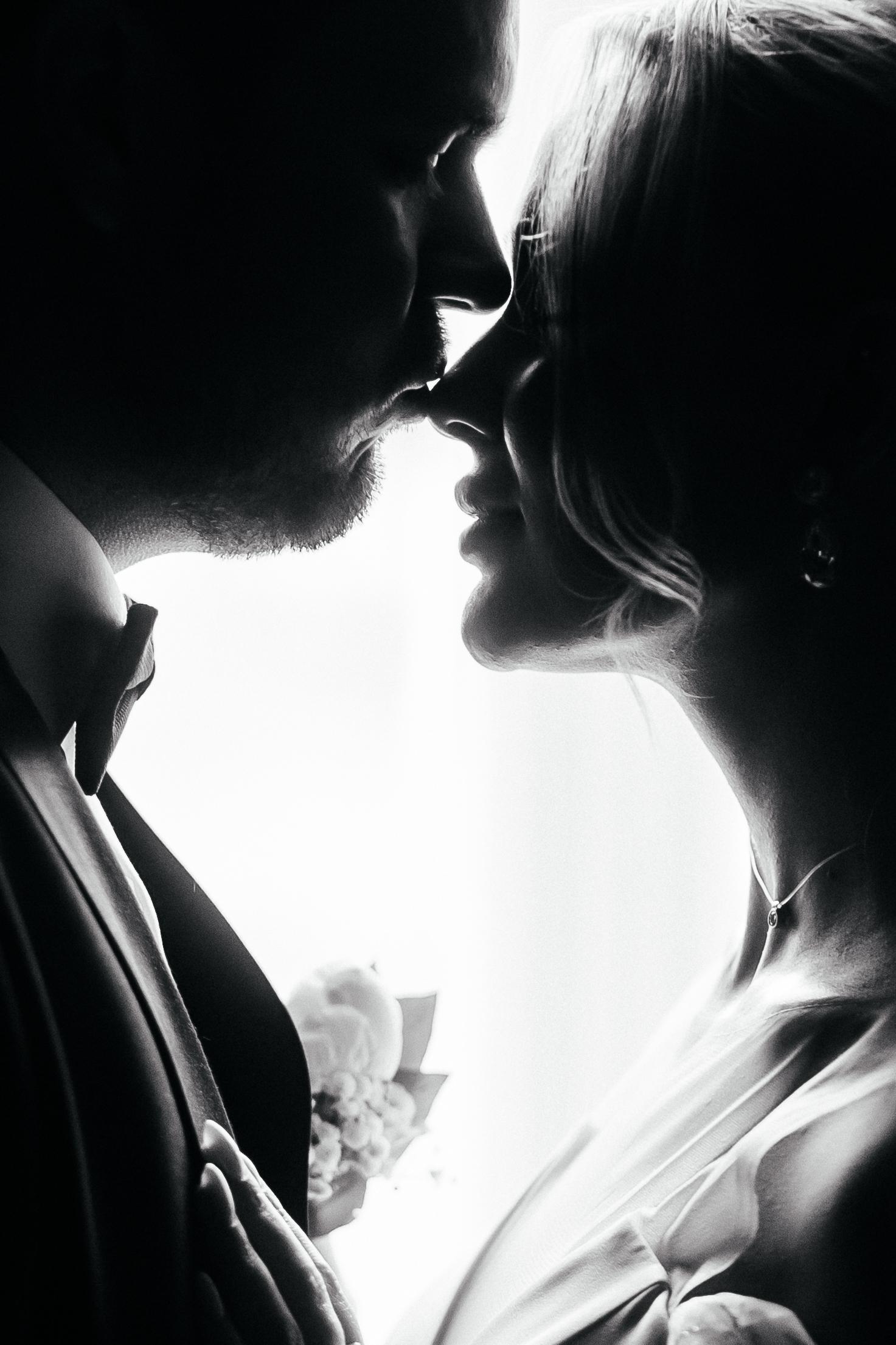 Black and white close portrait of a wedding couple