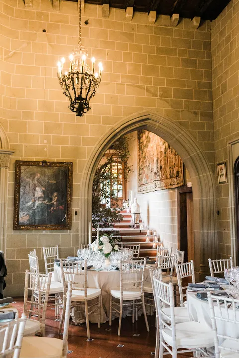 Stone reception room and staircase at La Baronia