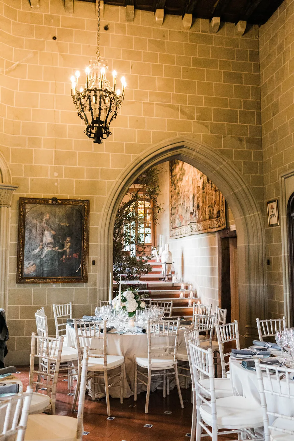Stone reception room and staircase at La Baronia