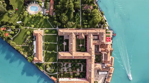 Aerial view of San Clemente Palace and its island gardens