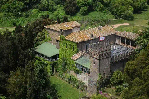 Castello di Torcrescenza surrounded by woodland