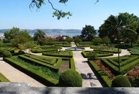 Formal garden and fountain at Vandelli Botanical Garden in Lisbon