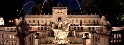 Illuminated fountain and façade at Villa Visconti Borromeo Litta
