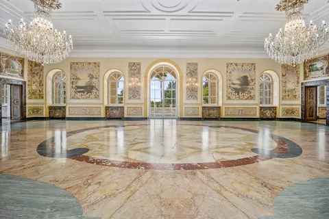 Historic reception hall with chandeliers at Villa Miani